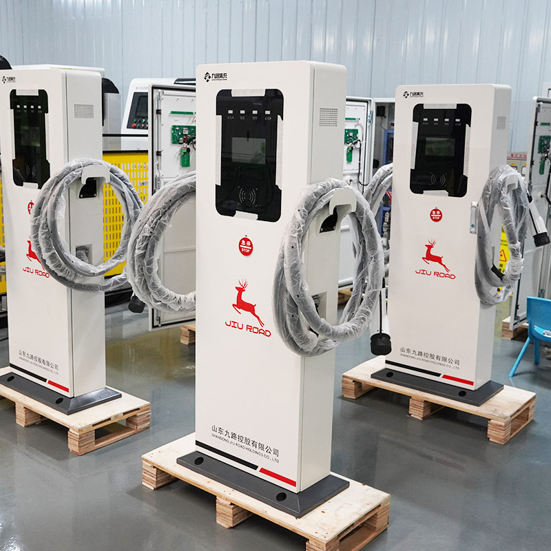 Commercial DC Fast Charger installation showing heavy-duty power cabinets and dual dispensers